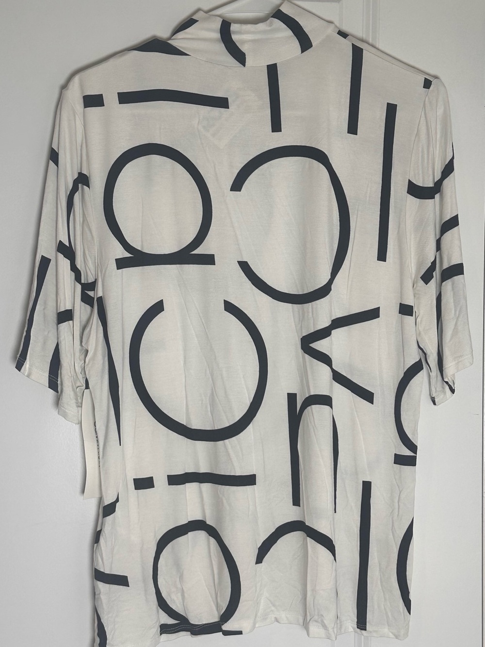 Calvin Klein White Short-Sleeve Top with Black Graphic Motif